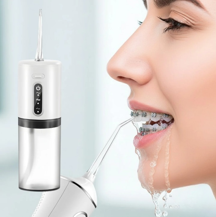 Irrigador oral para cuidados dentários com bicos intercambiáveis | elesira