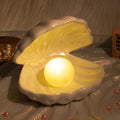Lampada a conchiglia chic | Una lampada magica con perla | elesira