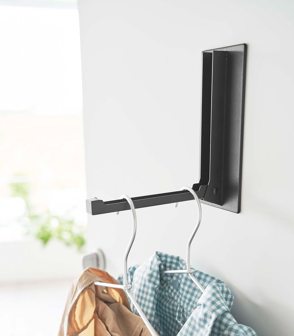 Pladsbesparende sammenfoldelig krog med magnetisk design | elesira