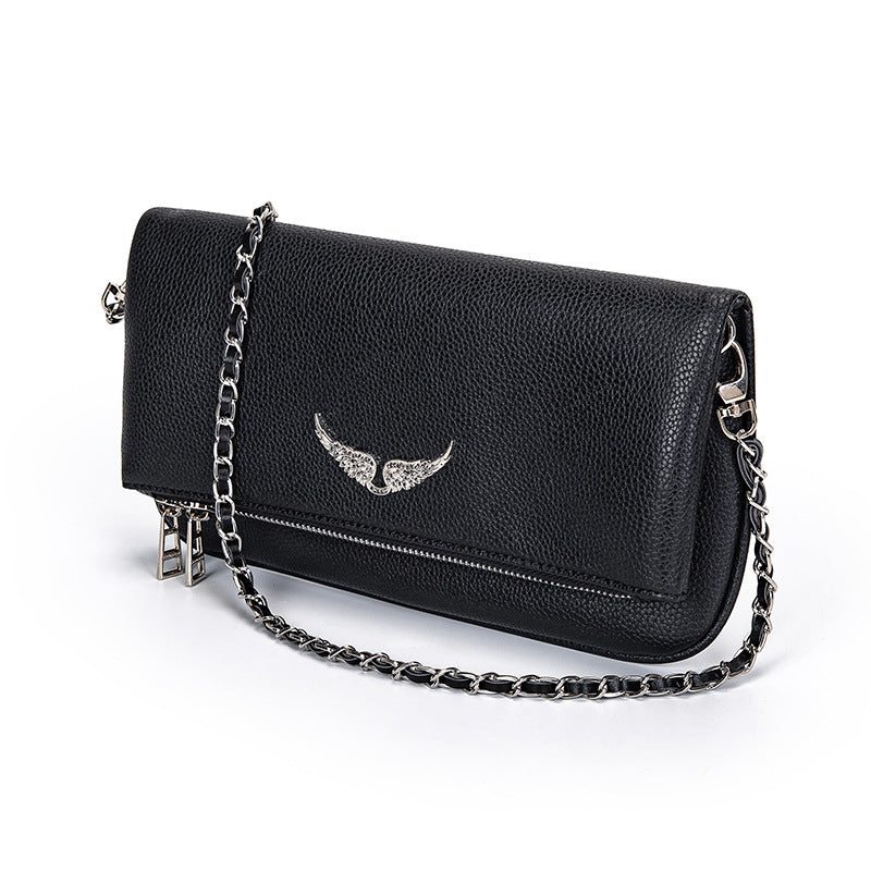 Tyylikäs minimalistinen clutch-laukku kaikkiin tilaisuuksiin | elesira
