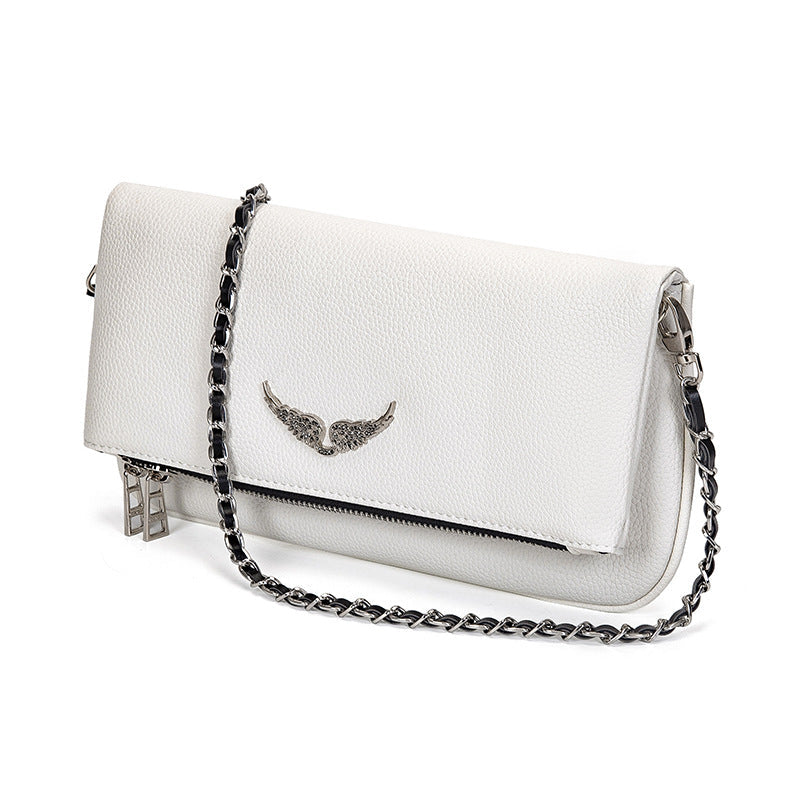 Tyylikäs minimalistinen clutch-laukku kaikkiin tilaisuuksiin | elesira