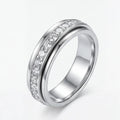 Bague tournante avec incrustation en zircone - acier titane en trois couleurs | elesira