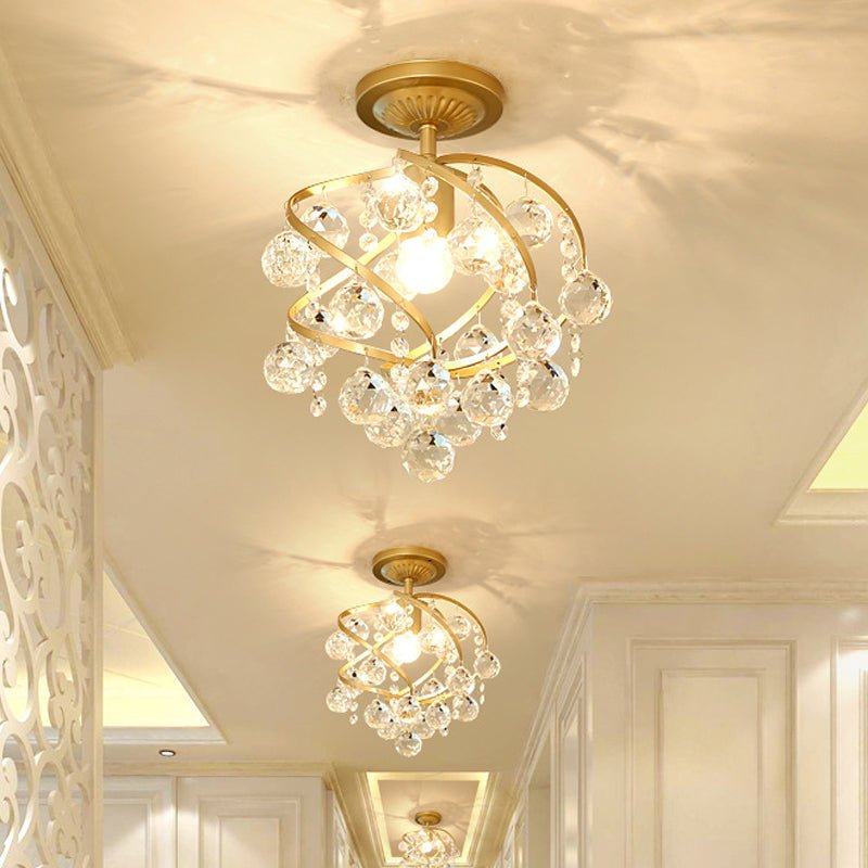 Ceiling lamp with crystal ball and brass accents | elesira