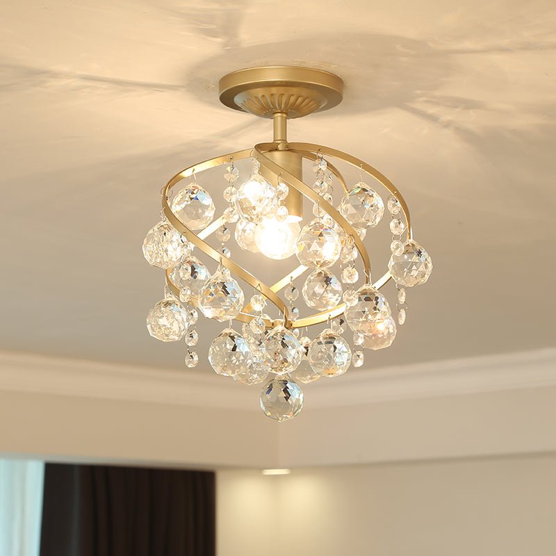 Ceiling lamp with crystal ball and brass accents | elesira