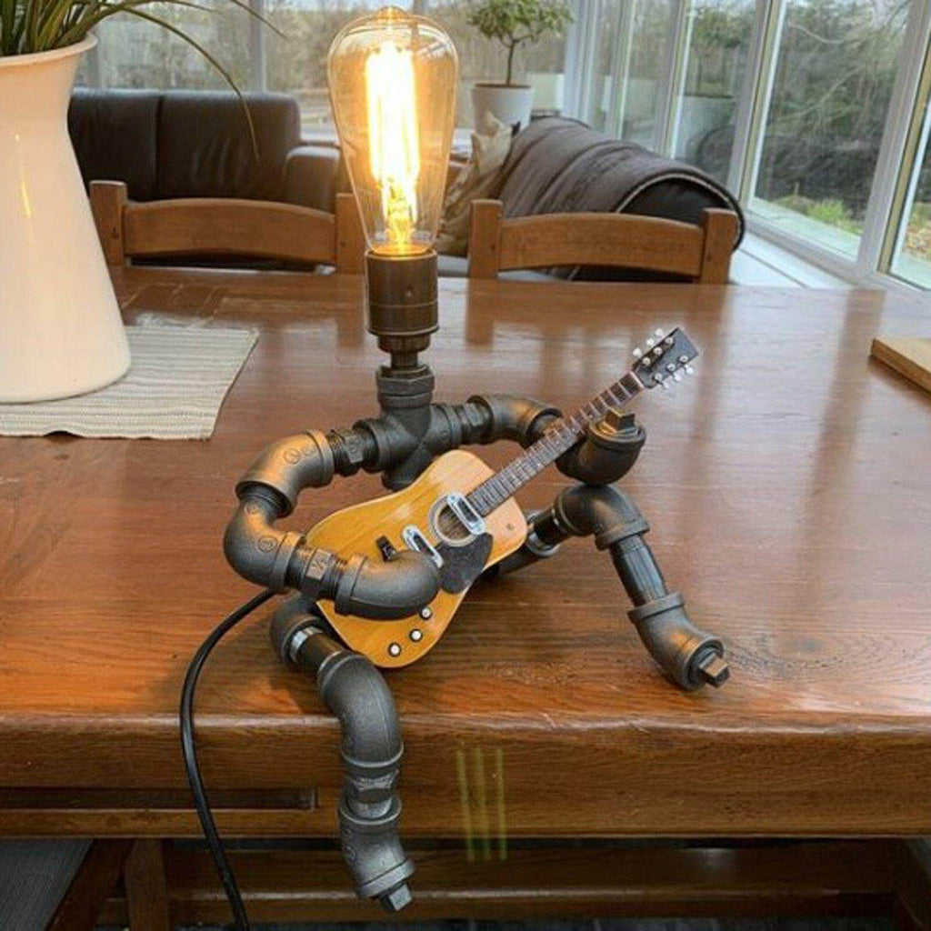 Retro lampa stołowa z gitarzystą, tworząca przytulną atmosferę | elesira